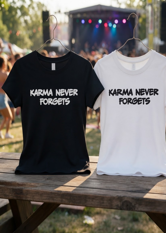 Black and white SERITEX DI SALA SHOP t-shirts with 'KARMA NEVER FORGETS' text on a wooden table.